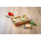 Stylish Pyrex Cook and Store large oven dish with lid, measuring 40x27cm, perfect for serving and storing tasty dishes.