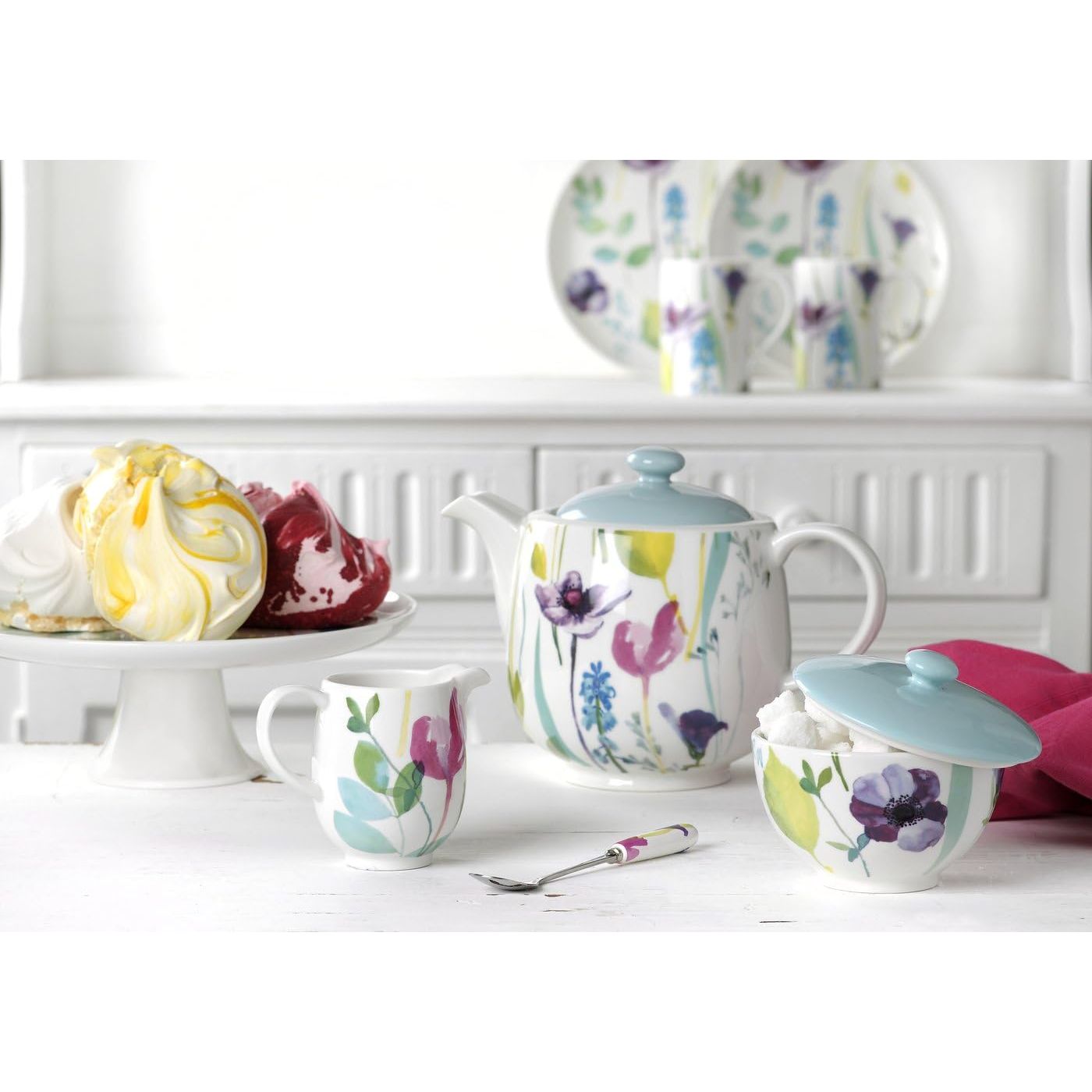 Beautifully arranged Portmeirion Water Garden 3 Piece Teapot Set, perfect for an inviting afternoon tea setting.
