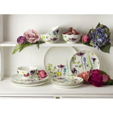 Close-up of the Portmeirion Water Garden 12 Piece Dinner Set showcasing colourful flowers on dinner plates, ideal for adding charm to any floral dinner set.