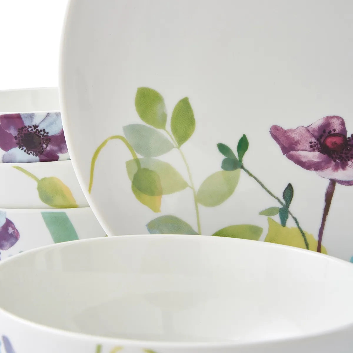 Portmeirion Water Garden 12 Piece Dinner Set displayed with bowls and plates, highlighting the floral patterns perfect for a floral dinner set.