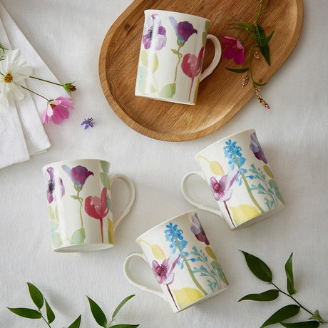 Elegant Portmeirion Water Garden Mugs set with stunning watercolour flowers in pink, blue, and purple, ideal for adding charm to your kitchen as water garden mugs.