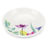 All four bowls of the Portmeirion Water Garden Pasta Bowl Set of 4 arranged together, featuring the colourful floral design on white porcelain, an essential pasta bowl set for entertaining.