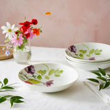 A single Portmeirion Water Garden Pasta Bowl from the set, showcasing its shallow shape ideal for pasta and sauce, making it a must-have in any kitchen as part of a pasta bowl set.