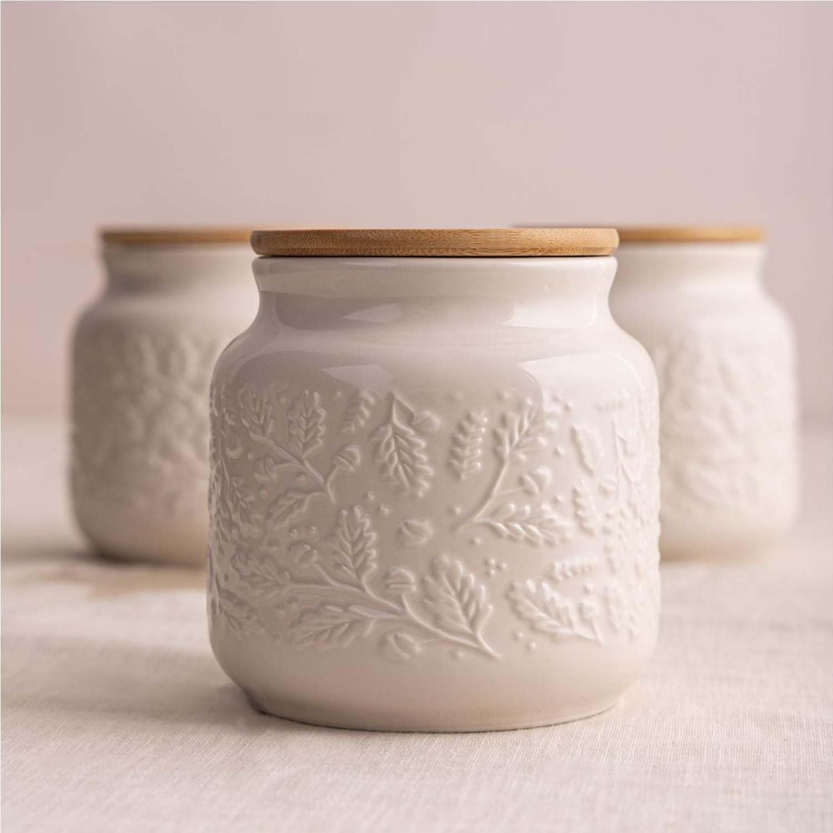 Airtight Price & Kensington Acorn Coffee Jar with a wooden lid and silicone seal, ideal for storing coffee.