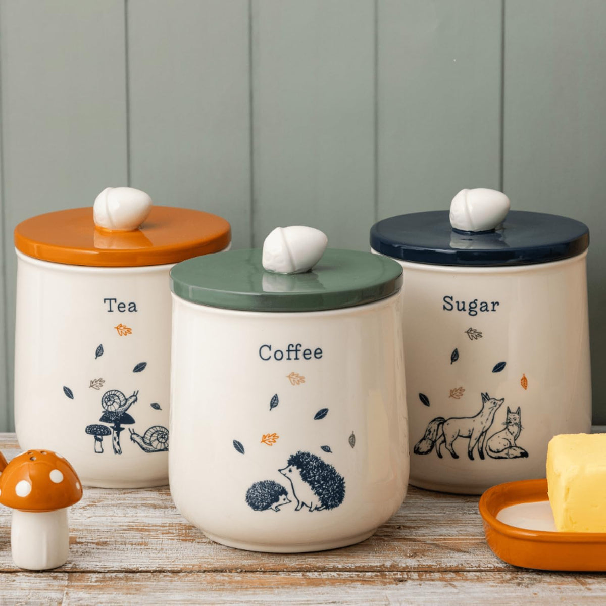 The Price & Kensington Ceramic Tea Jar Woodland, an elegant ceramic tea storage jar with identification text and coordinating colour scheme for kitchen decor.