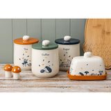 Price & Kensington Ceramic Coffee Jar Woodland on a kitchen counter, highlighting its 1-litre capacity for keeping coffee cool and dry.