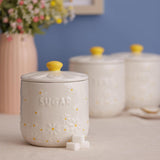 Beautifully designed Price & Kensington Daisy Sugar Storage Jar in soft cream glaze; a functional airtight ceramic canister for your kitchen decor.