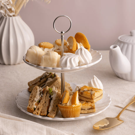 Close-up of Price & Kensington Luxe 2 Tier Cake Stand White showcasing its scalloped edge and glossy finish, essential for any two tier cake stand collection.