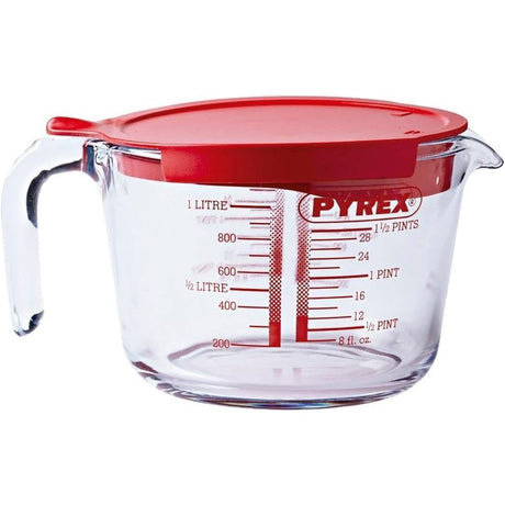 Pyrex Classic Glass 1L Jug With Lid - glass measuring jug featuring a red lid and practical measurement markings for easy pouring.