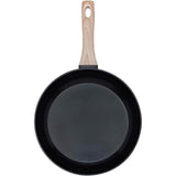 Top view of the Pyrex Cook & Care recycled aluminium frying pan, suitable for all heat sources, featuring a wood effect handle. Perfect for cooking.