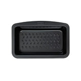 High-quality Pyrex Glide Loaf Tin showcasing its ergonomic side handle for easy handling, designed for non-stick performance.