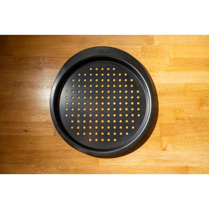 Pyrex Glide Pizza Tray 31cm with ergonomic side handle, a reliable non-stick pizza tray for homemade pizzas.