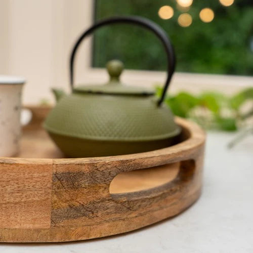 Stylish 30cm Round tray made of mango wood, demonstrating its use as a decorative catch-all mango wood serving tray.