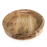 30cm Round mango wood serving tray used as a centerpiece, emphasizing the natural beauty and simplicity of the wood.