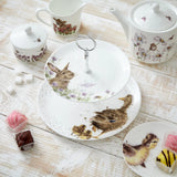 Beautifully designed Royal Worcester Wrendale Designs two-tier cake stand perfect for serving desserts with characterful animal art.