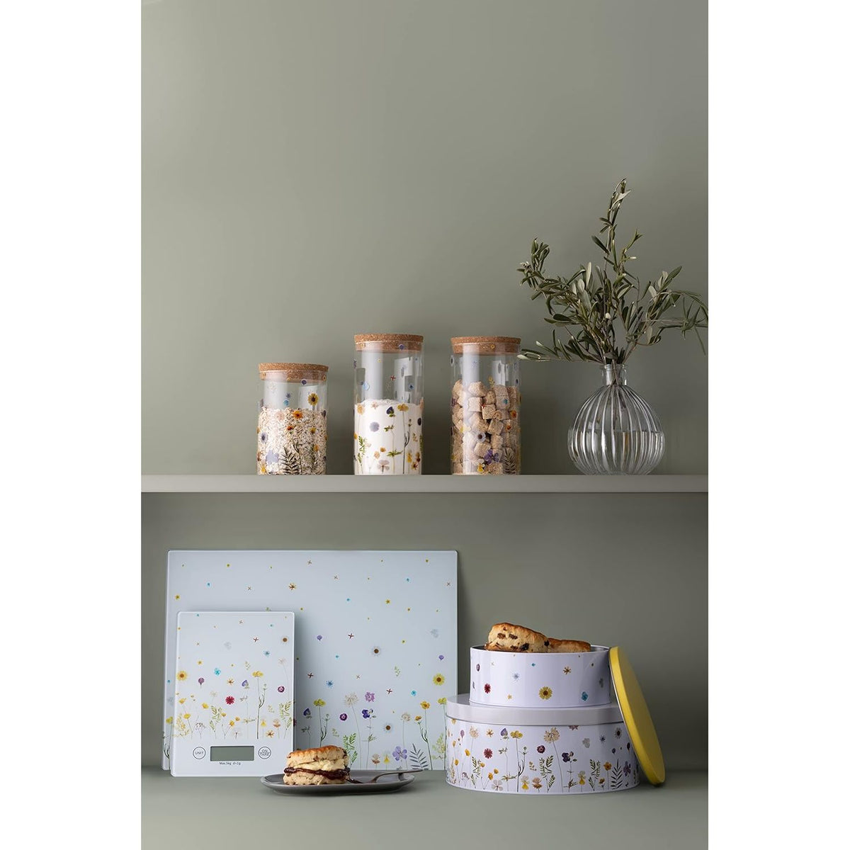 Stylish display of Typhoon Botanics Set of 2 Cake Tins alongside other storage items, perfect for cake storage tins in any kitchen.