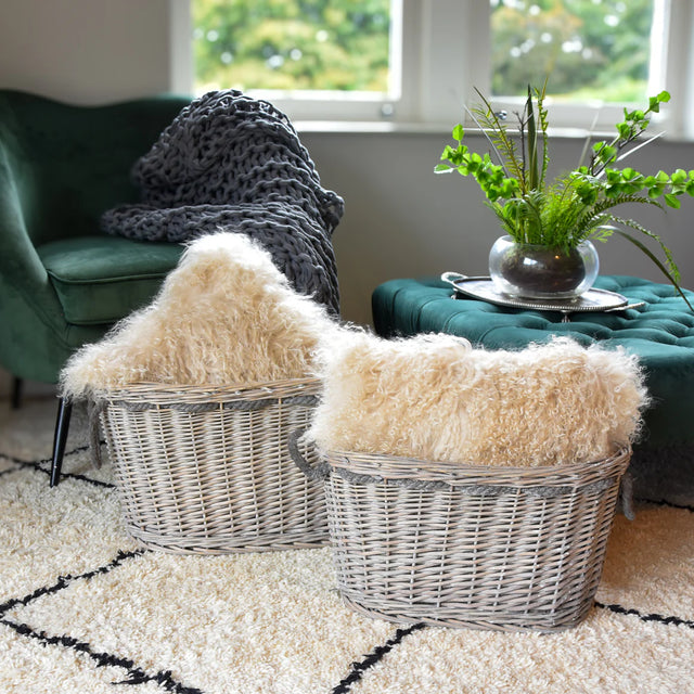Set of 2 Oval Log Basket in Grey Wash displaying a rustic design for storing logs or blankets.