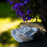 Display of the Small Resin Stone Rose Ornament on a shelf, ideal as a decorative stone rose accent in calm, neutral spaces.