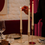 Spaas ivory tapered dinner candles, perfect for adding a touch of elegance to your table settings.