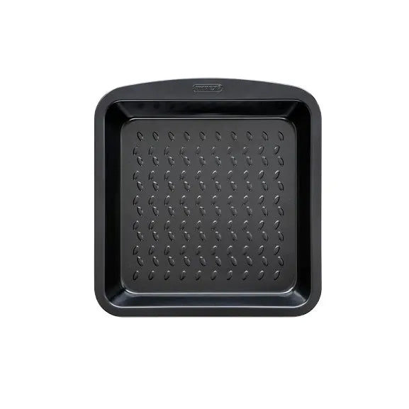 Pyrex Glide Square Roaster 24x24cm placed on a kitchen countertop, demonstrating its elegant design as a non-stick square roaster.