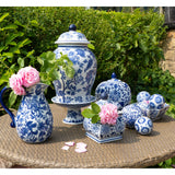 Sumatra Blue & White Cake Stand 8" Small Ceramic Cake Stand surrounded by other beautiful blue and white ceramics, enhancing the table decor.