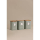 Set of three Typhoon Living Squircle Mint Tea Canisters with bamboo lids, labelled for tea, coffee, and sugar, showcasing their practical use.