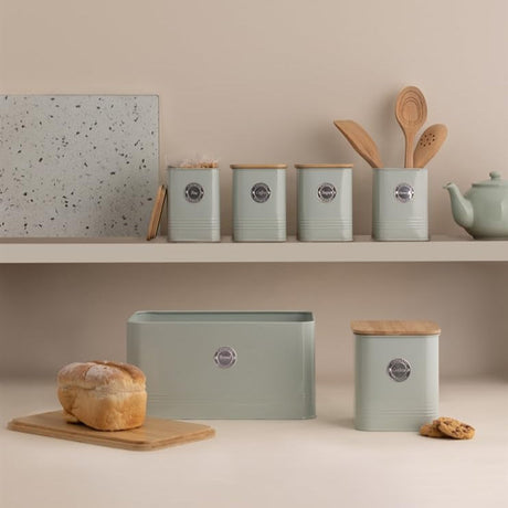 Stylish Typhoon Living Squircle Tea Coffee Sugar Storage Set displayed on a kitchen shelf, showcasing the mint green canisters alongside other kitchen accessories, ideal for home storage.
