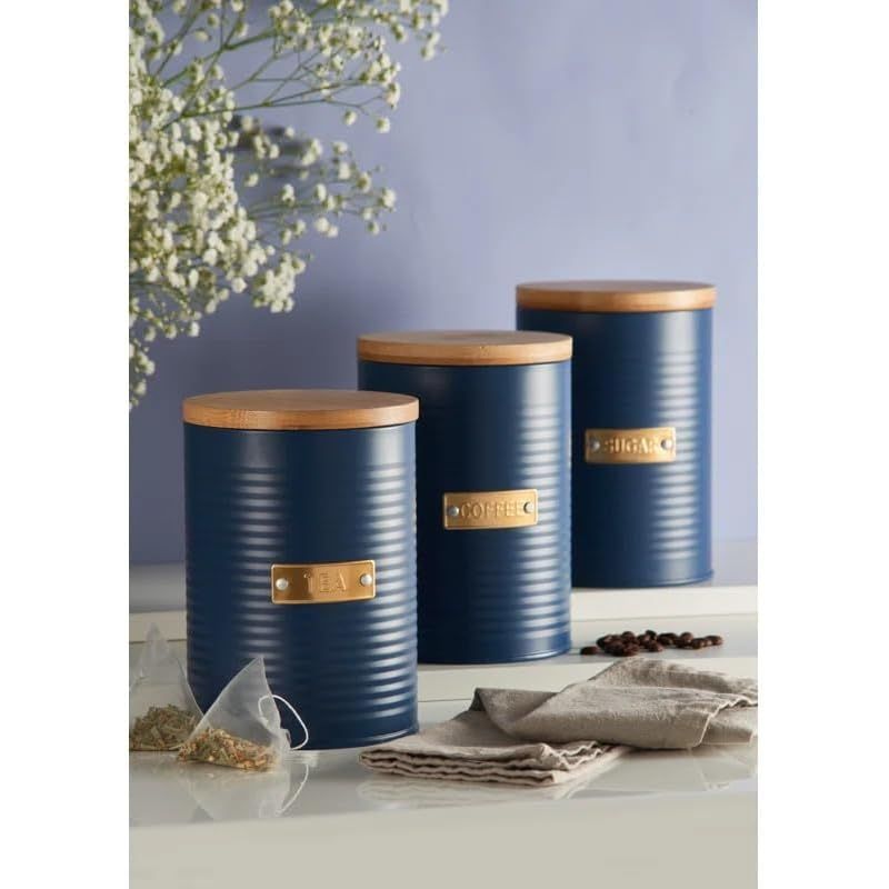 Typhoon Otto Kitchen Storage Canister Set displayed with tea, coffee, and sugar canisters alongside tea bags, highlighting functional kitchen organisation.