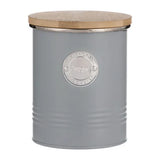 Close-up of Typhoon Living metal kitchen canister set showcasing the vintage grey finish and embossed medallion detail.