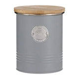 The bamboo lids of the Typhoon Living metal kitchen canister set featuring silicone seals for freshness, ideal for tea and coffee.