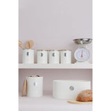 Range of Typhoon Living Cream Tea Canisters on a shelf, showcasing multiple sizes and a coordinated kitchen look.