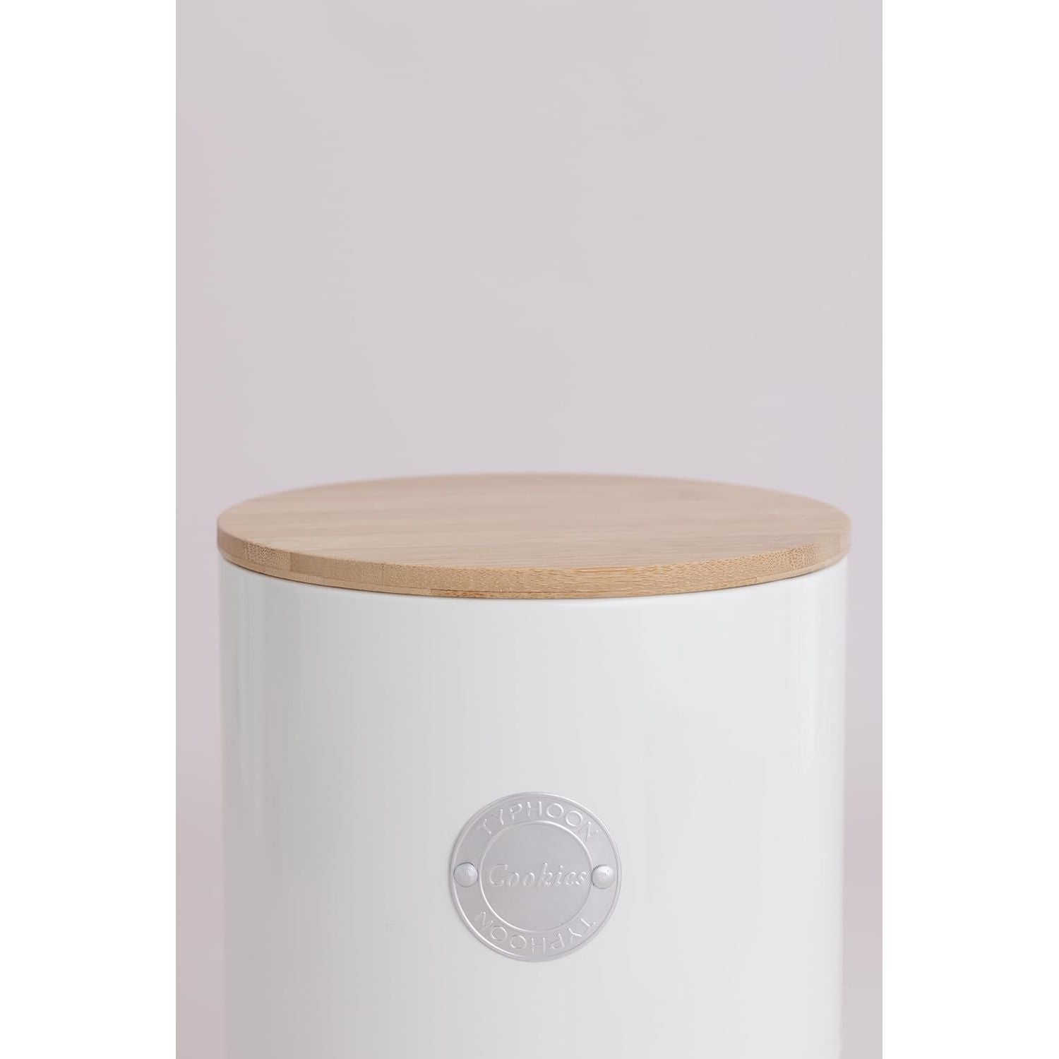 Close-up of Typhoon Living Cream Cookie Storage showcasing its elegant bamboo lid and sleek cream exterior.