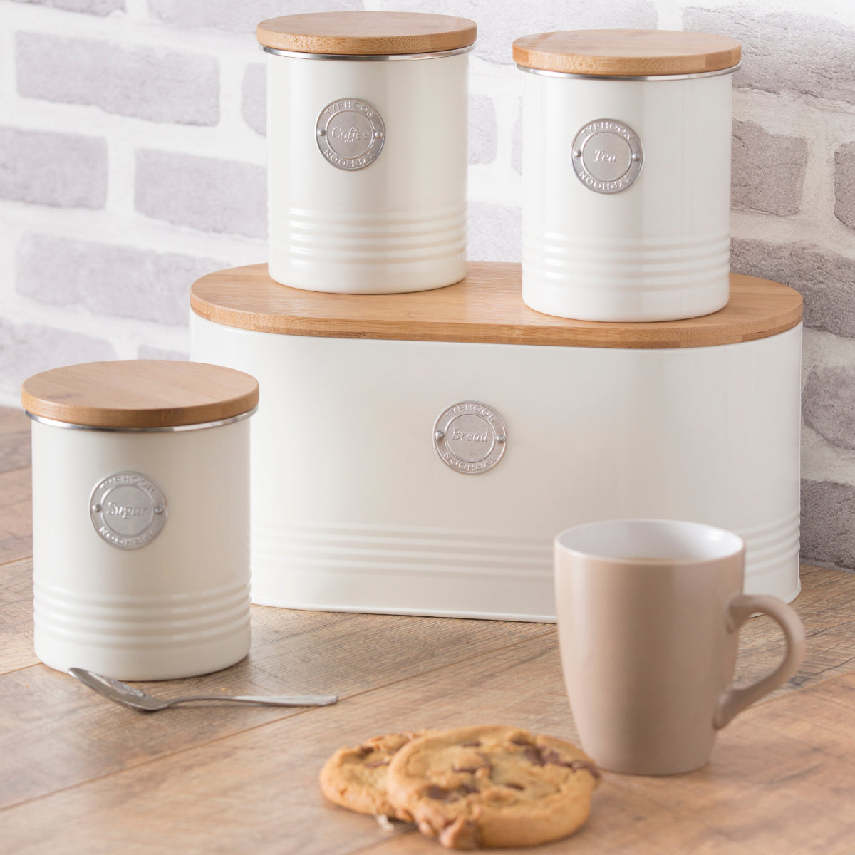 Stylish Typhoon Living Cream Tea Canister displayed with cookies, highlighting functionality and design.