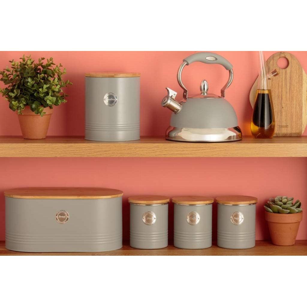 A beautifully arranged kitchen shelf featuring the Typhoon Living grey bread bin with bamboo lid, complementing the modern kitchen aesthetic.