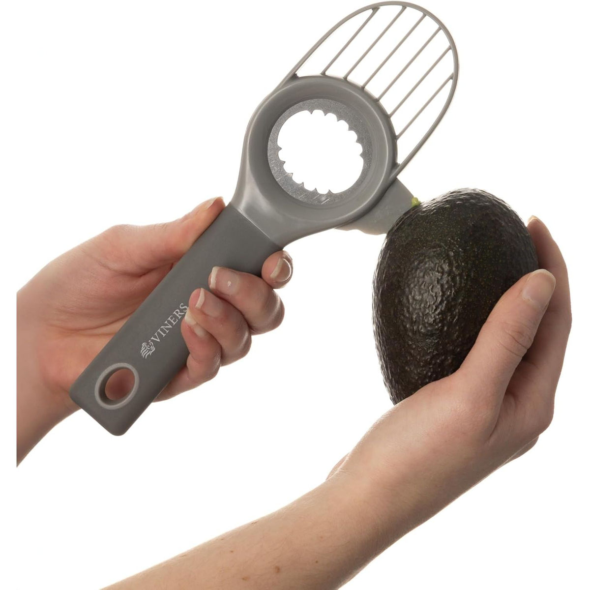 Viners 3 In 1 Avocado Tool displayed with avocados, demonstrating its effectiveness as an avocado cutting tool.