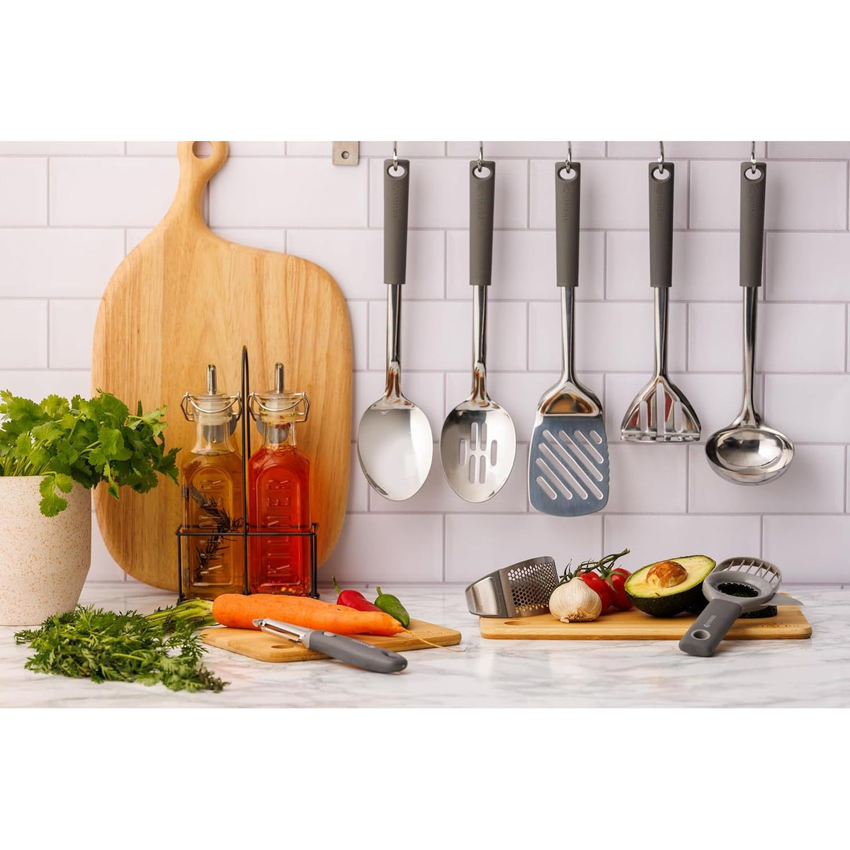 Viners Jar Opener tool with stylish two-tone grey finish, designed to fit perfectly in any kitchen decor.