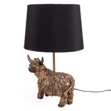 Highland Cow Desk Light with its elegant black fabric shade, bringing warm ambient lighting and farmhouse style to modern decor, the perfect highland cow lamp.