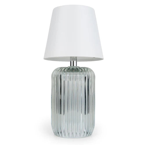 Elegant ridged glass table lamp demonstrating its versatility for various decor styles.