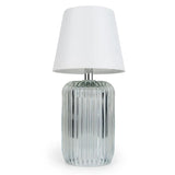 Elegant ridged glass table lamp demonstrating its versatility for various decor styles.