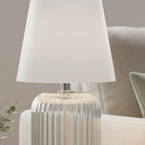 Stylish ridged glass table lamp, showcasing vintage design for modern interiors.