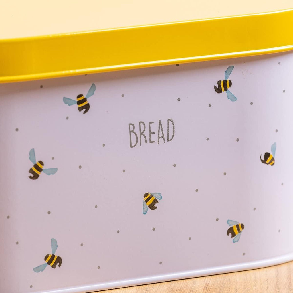 Price & Kensington Sweet Bee Bread Bin Yellow with bread with focus on name tag