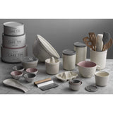Mason Cash Innovative Kitchen Set of 3 Cake Tins, illustrating the cream and pastel colour scheme of these stylish stackable cake tins.