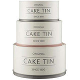 Mason Cash Innovative Kitchen Set of 3 Cake Tins, showcasing the stylish design of stackable cake tins in white, grey, and pink.