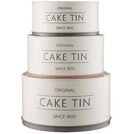 Mason Cash Innovative Kitchen Set of 3 Cake Tins, showcasing the stylish design of stackable cake tins in white, grey, and pink.