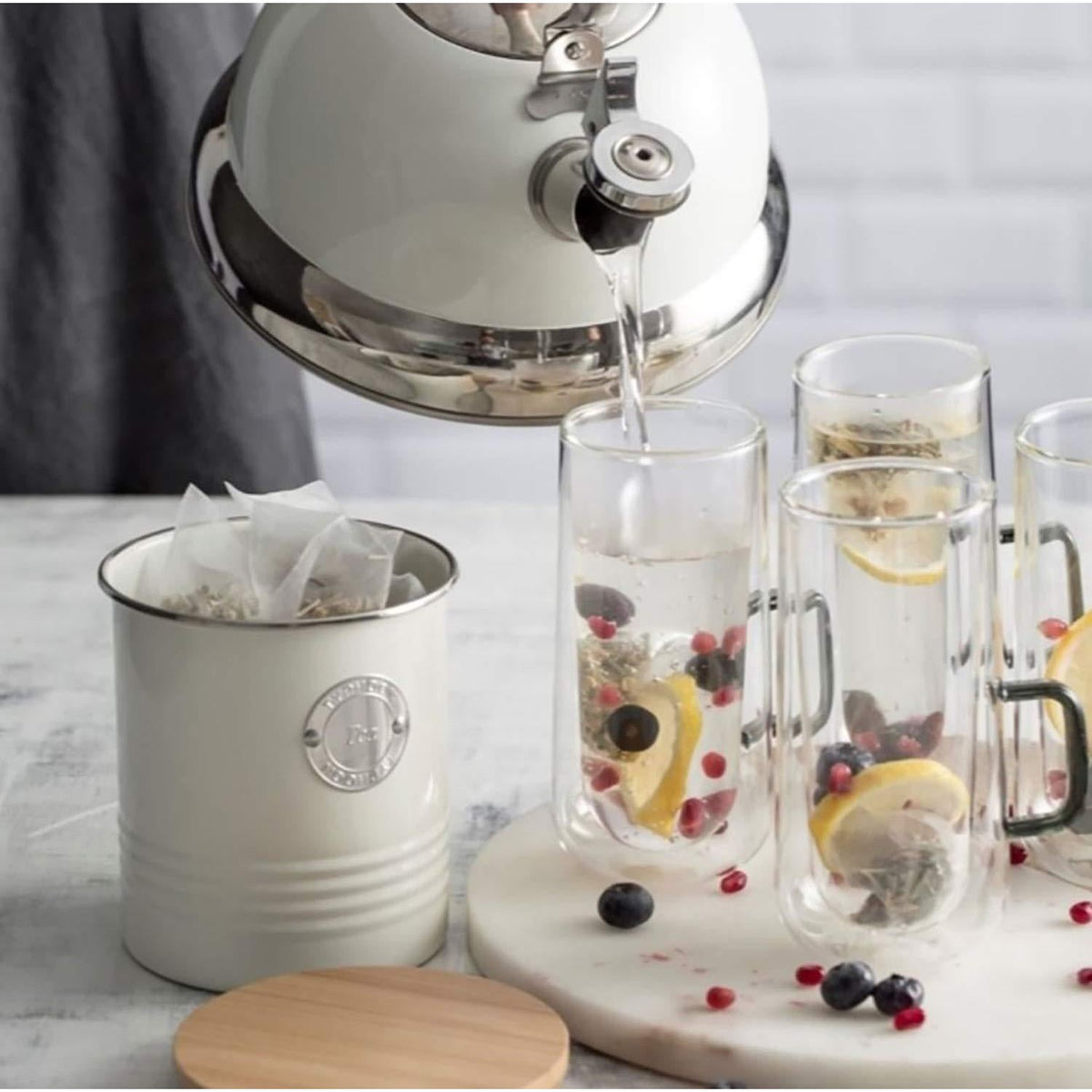 Close-up of Typhoon Living Tea Coffee and Sugar Storage Set of 3 Cream showcasing the airtight seals for freshness.