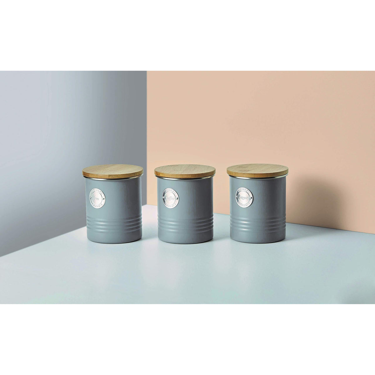 A close-up of Typhoon Living tea coffee sugar canisters set in grey, featuring airtight lids.