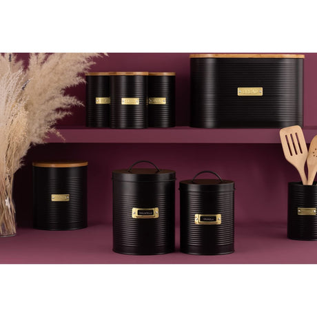 Multiple Typhoon Otto Black Cookie Storage canisters on shelves, featuring a modern design with bamboo lids, perfect for organising kitchen essentials.
