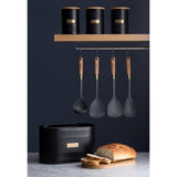 Typhoon Otto Black Set Of 3 Tea/Coffee/Sugar Storage highlighted with tea storage canisters on a countertop, providing storage solutions for any kitchen.